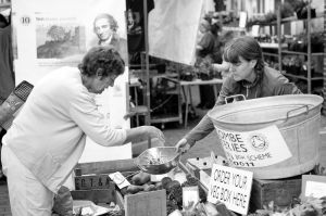 Shopper and trader at Lewes Farmer's Market 6th August 2011